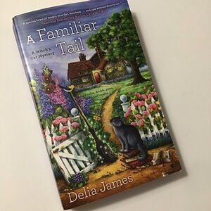 A Familiar Tail Delia James Witch's Cat Mystery #1 Mass Paperback 9780451476579